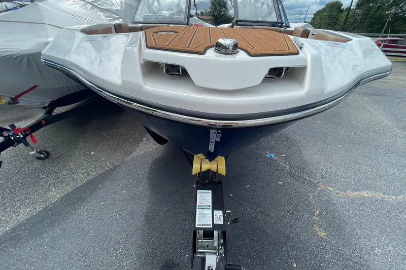 Slide: The Image of 2026 Yamaha 222SE boat front view on trailer, showcasing sleek design and modern features. - 5