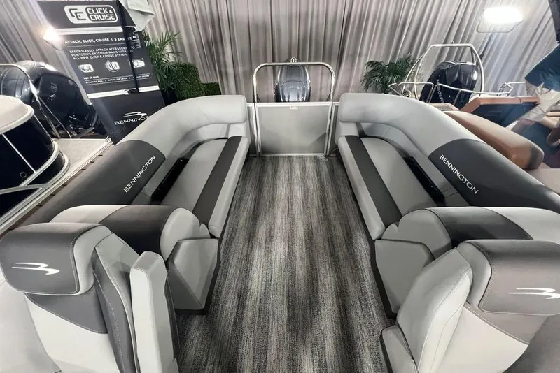 Slide: The Image of Interior of a 2026 Bennington SSR boat with luxurious seating and modern design. - 12