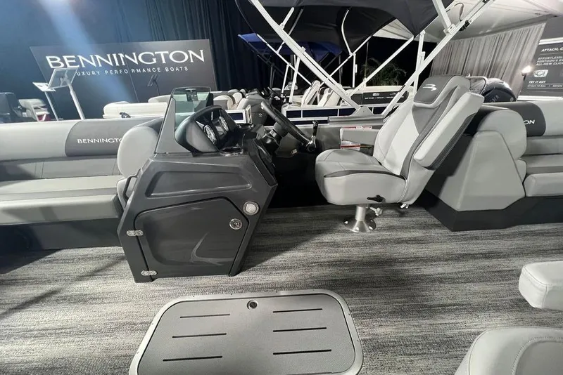 Slide: The Image of 2026 Bennington SSR luxury boat interior with modern helm and seating. - 9