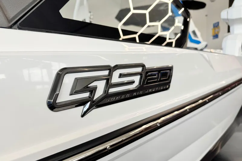 Slide: The Image of 2025 Nautique Super Air Nautique GS20 logo on sleek white boat exterior. - 11