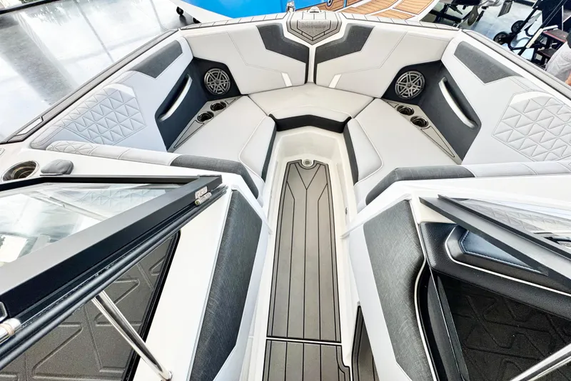 Slide: The Image of 2025 Nautique Super Air Nautique GS20 interior with sleek seating and modern design. - 6