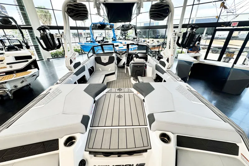 Slide: The Image of 2025 Nautique Super Air Nautique GS20 interior, showcasing sleek design and spacious seating. - 7