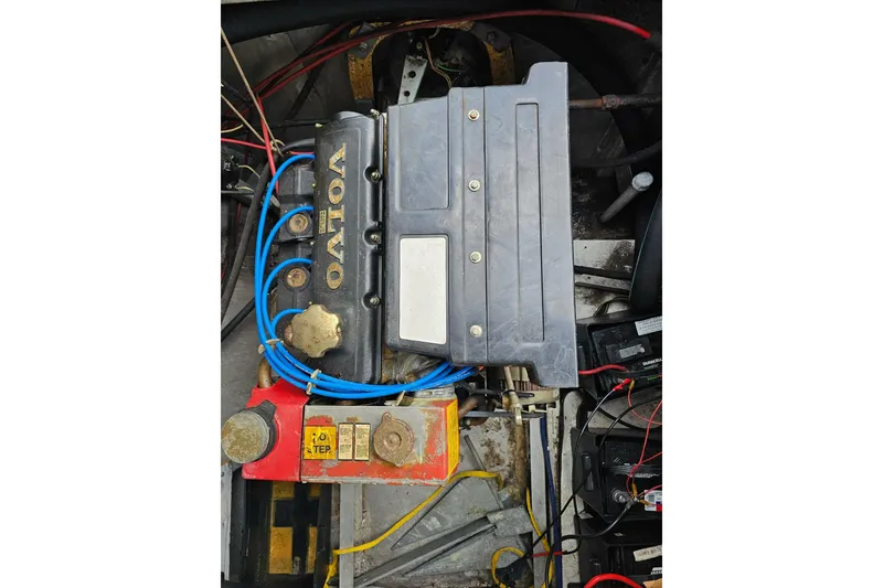 Slide: The Image of Engine compartment of a 1985 Sumerset 14x60 houseboat with Volvo components. - 37