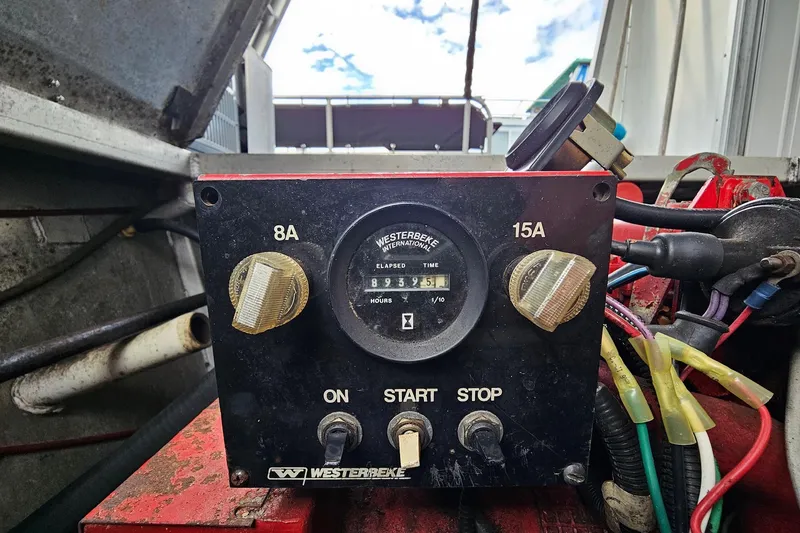 Slide: The Image of Control panel of a Westerbeke generator on a 1985 Sumerset 14x60 houseboat. - 38