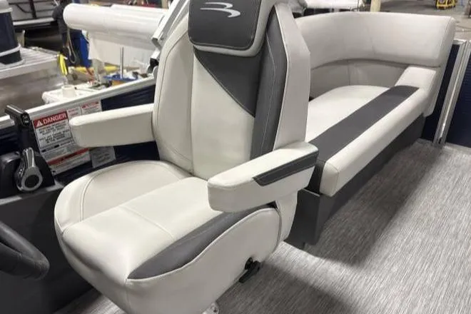 Slide: The Image of 2026 Bennington SSR boat interior with modern white and gray seating. - 4