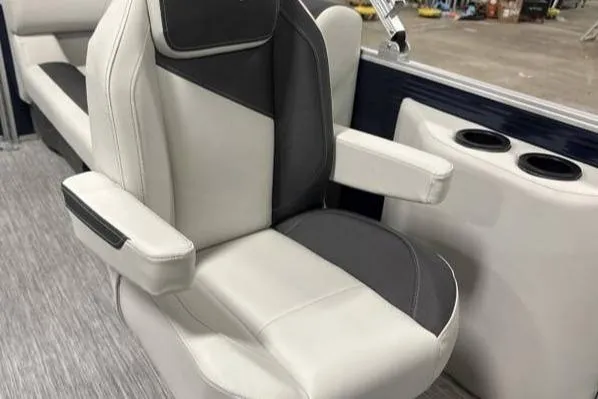 Slide: The Image of 2026 Bennington SSR boat seat with armrests and cup holders, featuring sleek design. - 5