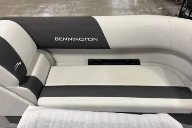 Slide: The Image of 2026 Bennington SSR boat seat with sleek black and white design. - 6
