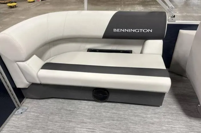 Slide: The Image of 2026 Bennington SSR boat seat with white and gray upholstery. - 8