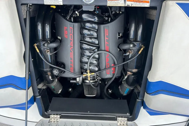 Slide: The Image of 2014 Supra SA 450 engine bay featuring a Corvette LS3 engine. - 17