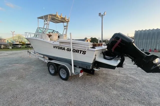 Slide: The Image of 1989 Hydra-Sports 2500WA boat on trailer, parked outdoors at sunset. - 1