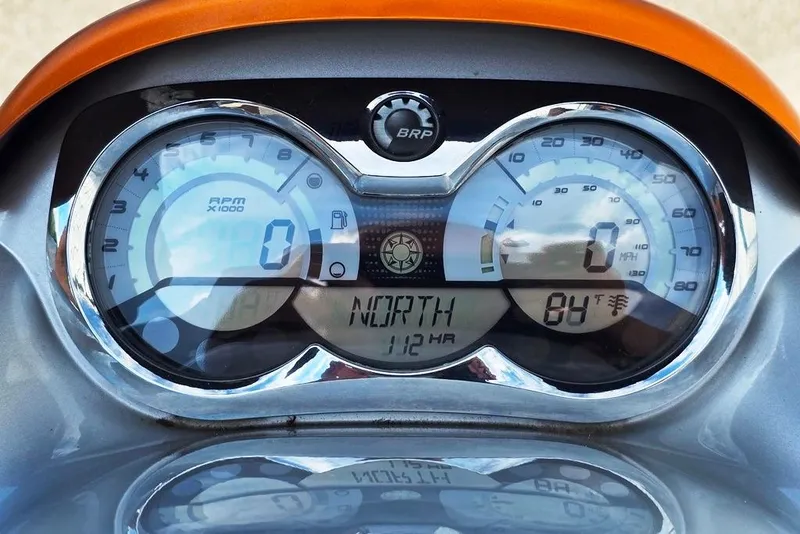 Slide: The Image of Dashboard of a 2009 Sea-Doo RXT 255 showing speed, RPM, and temperature. - 4