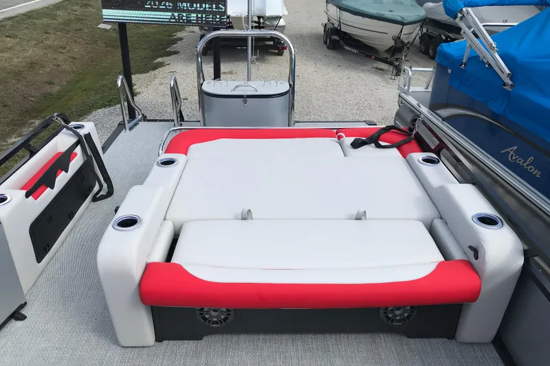 Slide: The Image of Red and white seating on 2026 Avalon LSZ ENTERTAINER boat, featuring sleek design and modern amenities. - 11