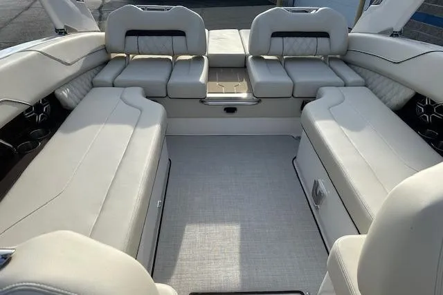 Slide: The Image of 2026 Regal LS6 boat interior with luxurious white seating and spacious layout. - 11