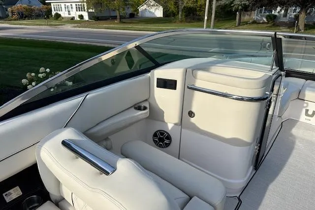 Slide: The Image of 2026 Regal LS6 boat interior with white leather seating and sleek design. - 12