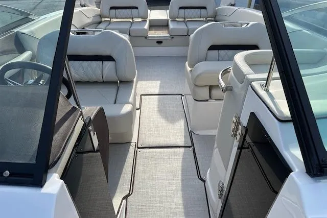 Slide: The Image of 2026 Regal LS6 boat interior with luxurious seating and modern design. - 22
