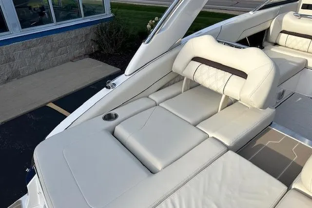 Slide: The Image of 2026 Regal LS6 boat with luxurious white leather seating and sleek design. - 6