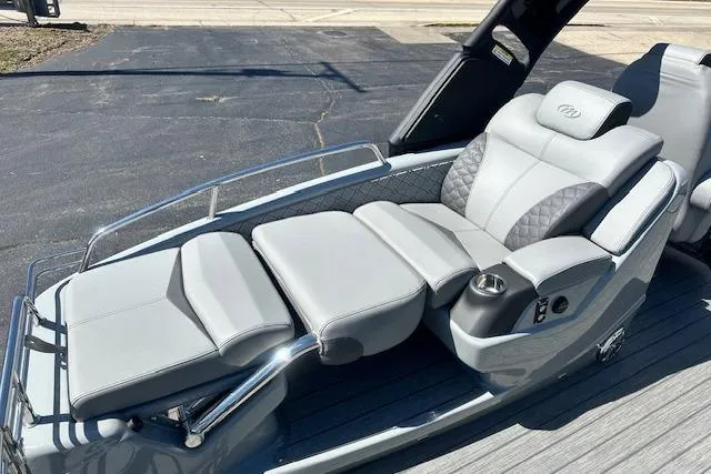 Slide: The Image of Luxurious seating on 2024 Manitou LX 25 SRS boat, featuring sleek design and comfortable upholstery. - 15