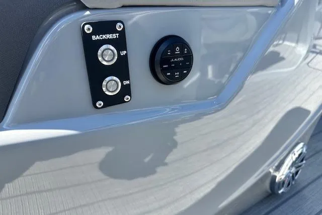 Slide: The Image of Control panel of 2024 Manitou LX 25 SRS with backrest and audio controls. - 18