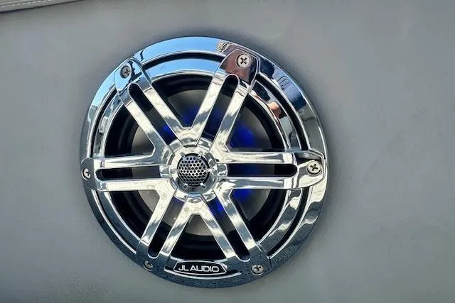 Slide: The Image of Chrome JL Audio speaker on 2024 Manitou LX 25 SRS boat. - 33