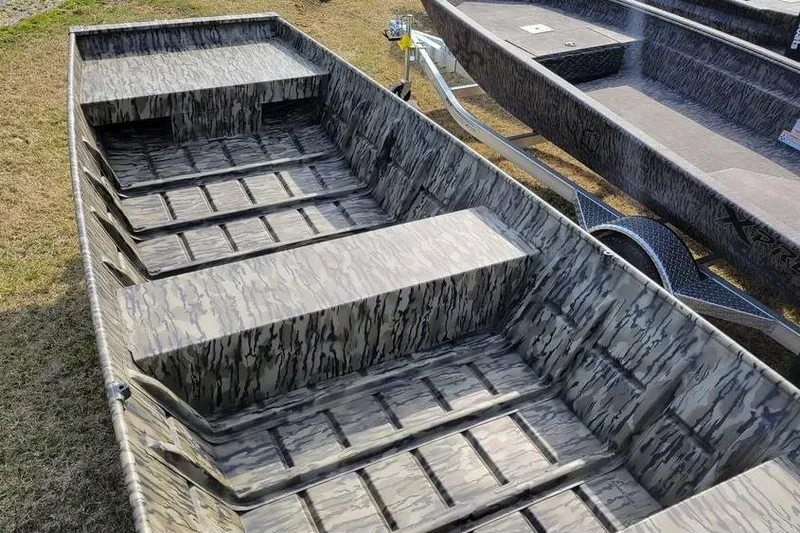 Slide: The Image of 2025 Smoker Craft 1648 jon boat with camouflage pattern, 16-foot length, 48-inch bottom width. - 5