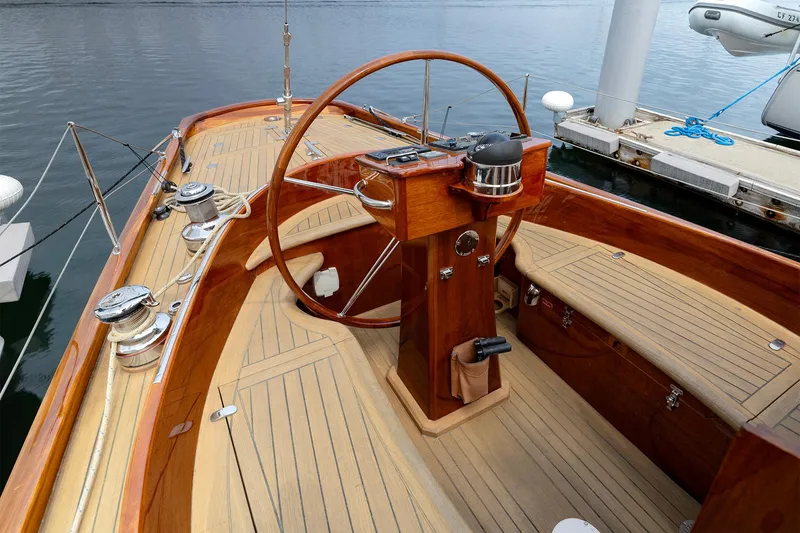 Slide: The Image of Elegant 2011 Spirit 50 DH yacht cockpit with wooden steering wheel and polished deck. - 11