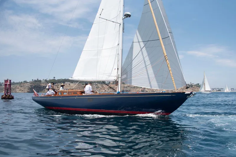 Slide: The Image of Sailing yacht Spirit 50 DH 2011 gliding on ocean with crew, clear sky background. - 3