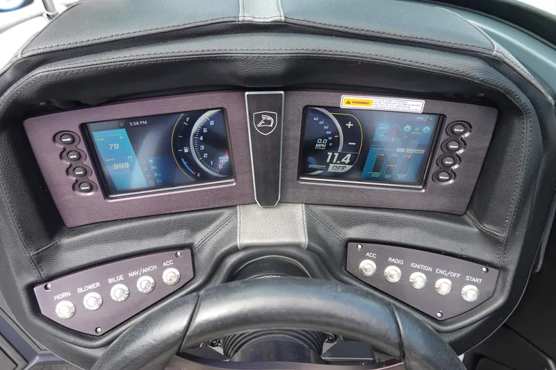 Slide: The Image of Dashboard of a 2017 Centurion Ri217 boat with digital displays and control buttons. - 11