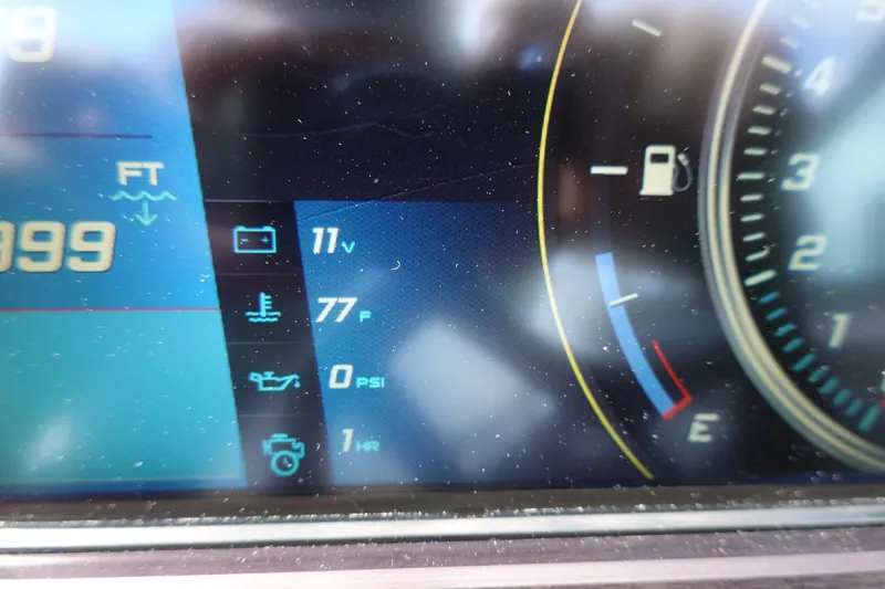 Slide: The Image of Dashboard of 2017 Centurion Ri217 showing voltage, temperature, and fuel gauge. - 12