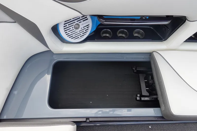 Slide: The Image of Interior of 2017 Centurion Ri217 boat showing speaker and seating area. - 21