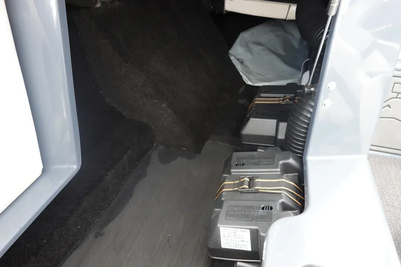 Slide: The Image of 2017 Centurion Ri217 interior showing battery compartment with secured batteries. - 23