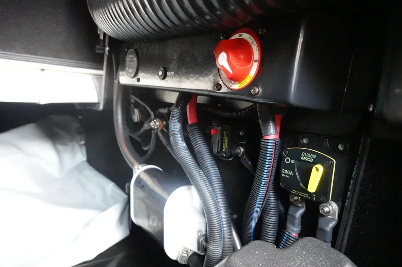 Slide: The Image of 2017 Centurion Ri217 boat electrical system with switches and wiring. - 24