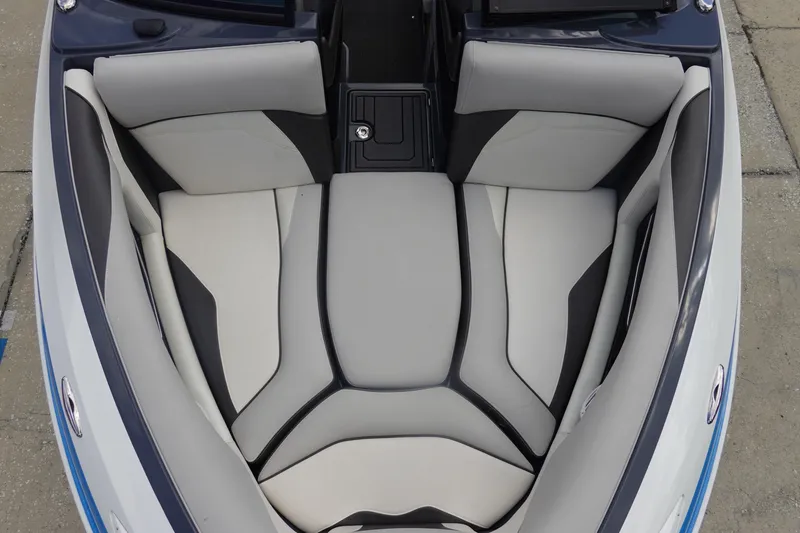 Slide: The Image of 2017 Centurion Ri217 boat interior with gray and white cushioned seating. - 31