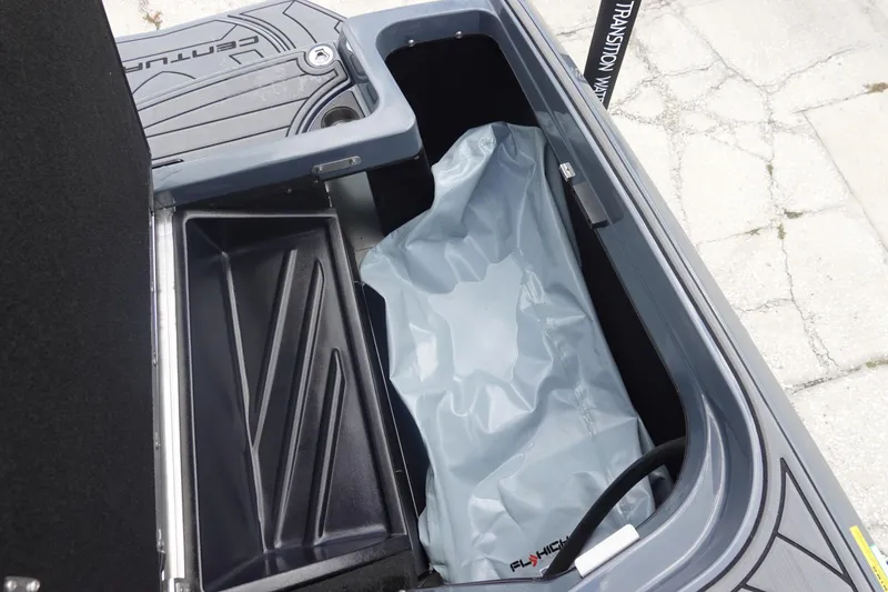 Slide: The Image of 2017 Centurion Ri217 boat storage compartment with Fly High ballast bag. - 37