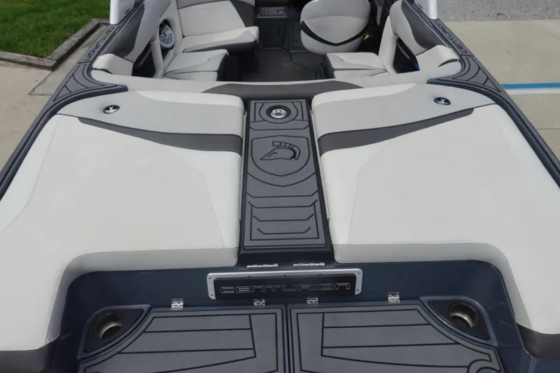 Slide: The Image of 2017 Centurion Ri217 boat interior with sleek seating and modern design. - 8