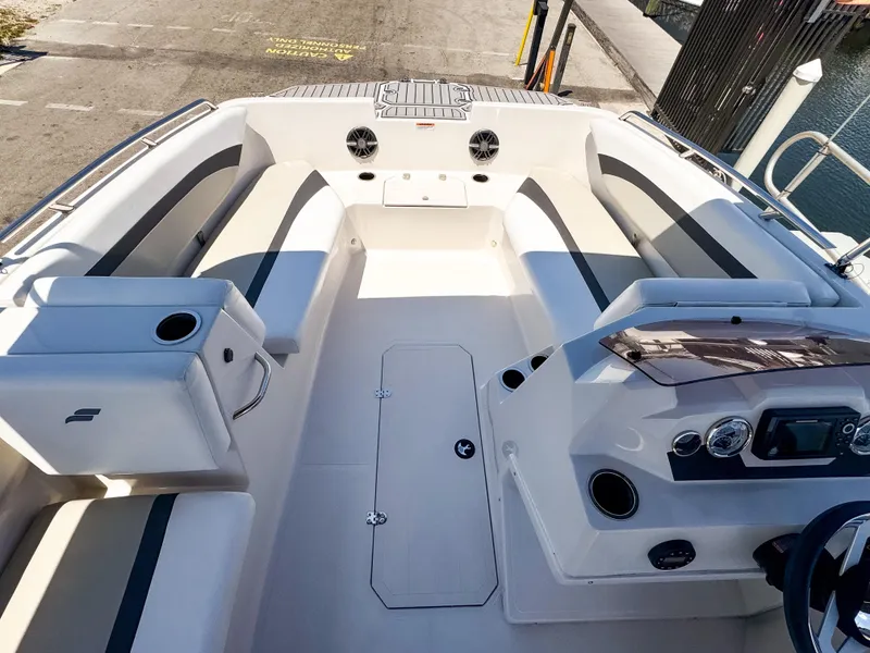 Slide: The Image of 2023 Starcraft SVX 171 OB boat interior with seating and control panel. - 16