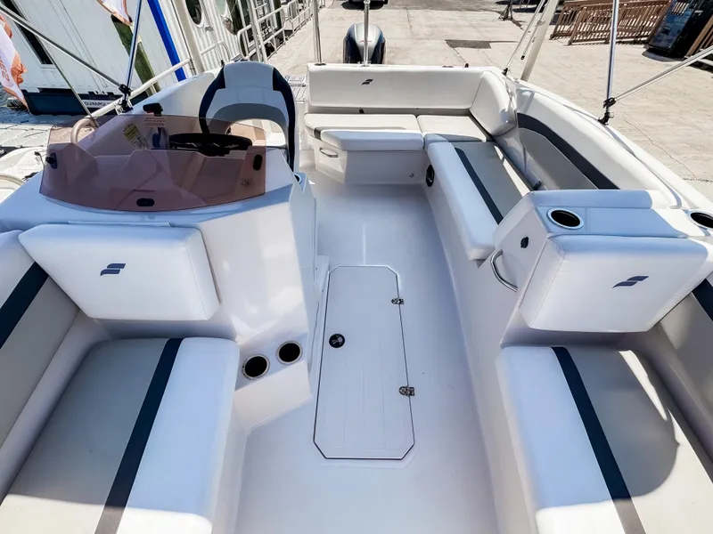 Slide: The Image of 2023 Starcraft SVX 171 OB boat interior with spacious seating and modern design. - 17