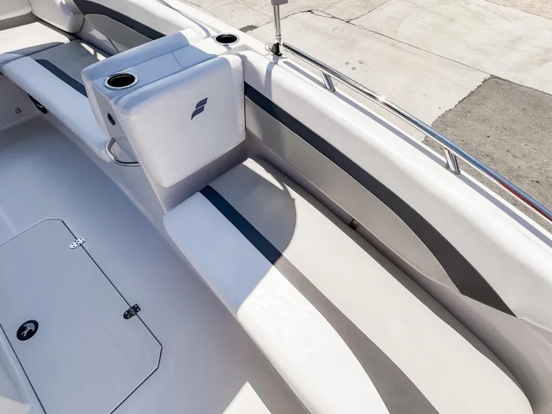 Slide: The Image of 2023 Starcraft SVX 171 OB boat interior with seating and cup holders. - 21