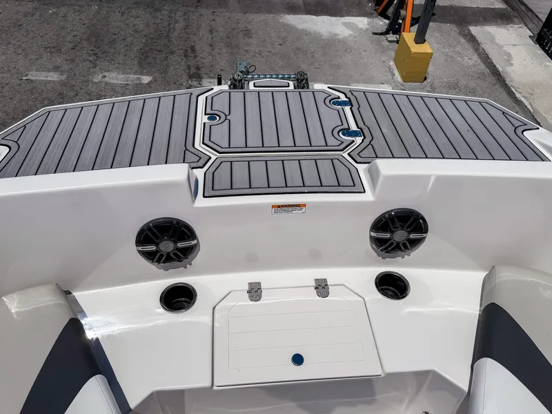 Slide: The Image of 2023 Starcraft SVX 171 OB boat interior with speakers and cup holders. - 23