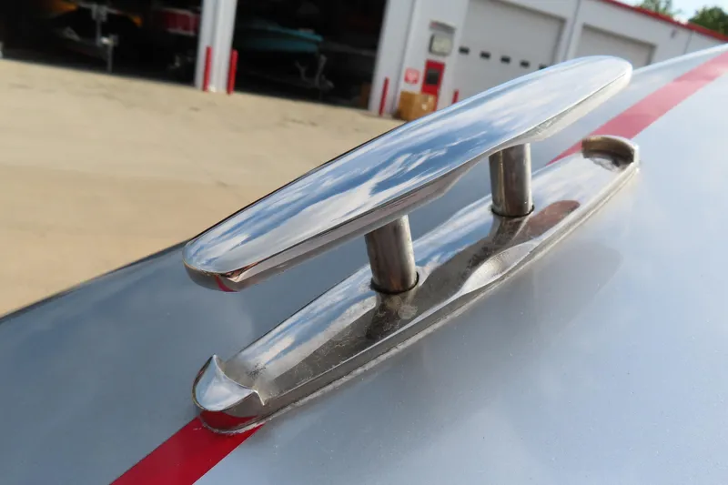 Slide: The Image of Close-up of a 2007 Donzi 35 ZR boat cleat with a red stripe. - 10