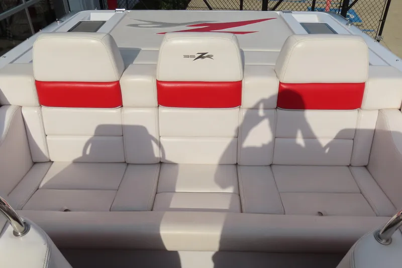 Slide: The Image of 2007 Donzi 35 ZR boat interior with white and red seating. - 18