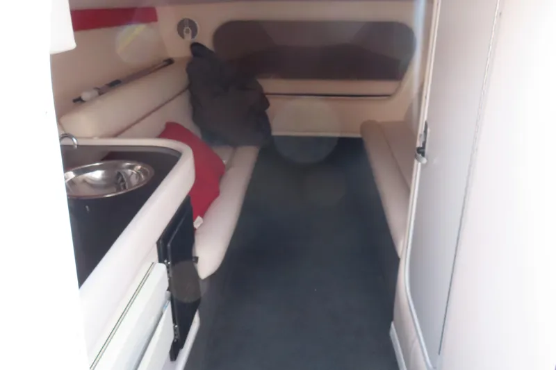 Slide: The Image of Interior cabin of a 2007 Donzi 35 ZR boat with seating and sink. - 20