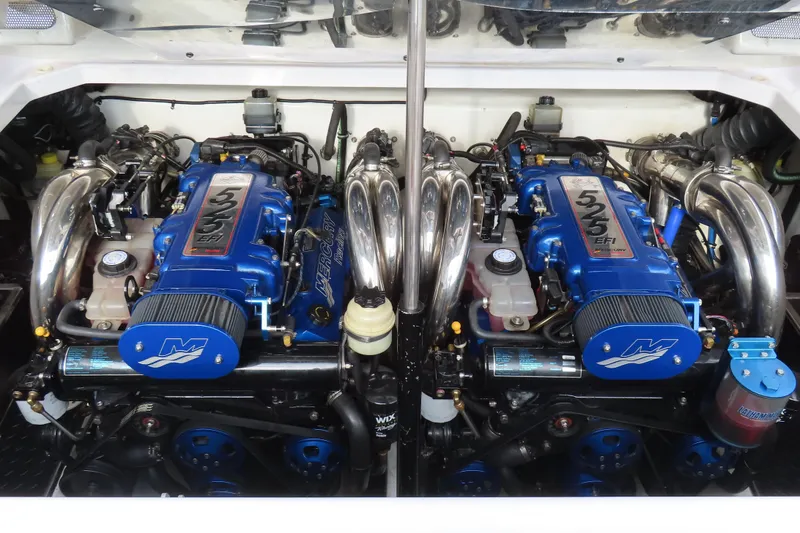 Slide: The Image of Twin Mercury 525 EFI engines in a 2007 Donzi 35 ZR boat, showcasing high-performance power. - 21