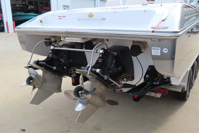 Slide: The Image of 2007 Donzi 35 ZR boat with dual propellers and powerful engines, rear view. - 7