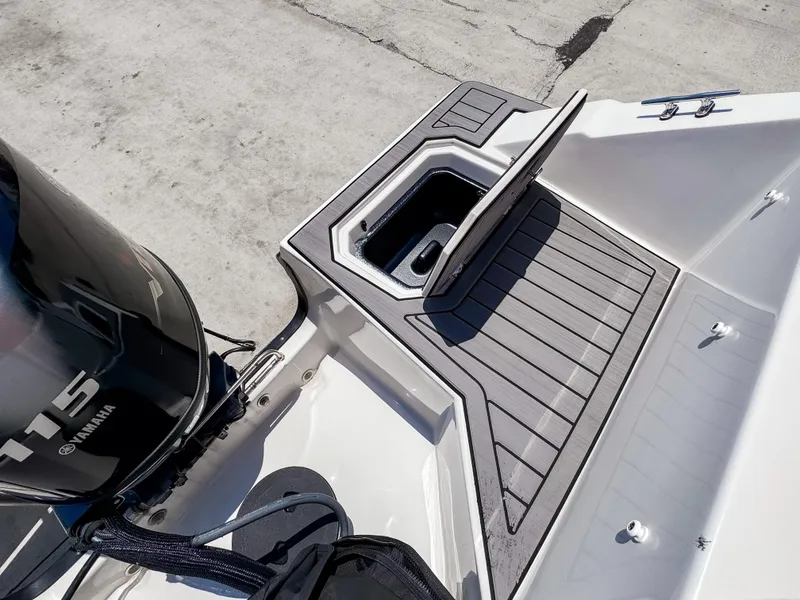 Slide: The Image of 2023 Starcraft SVX 171 OB boat with Yamaha 115 engine, featuring sleek deck design. - 10