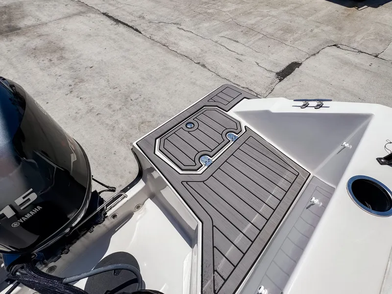 Slide: The Image of 2023 Starcraft SVX 171 OB boat with Yamaha 75 engine, featuring sleek deck design. - 9