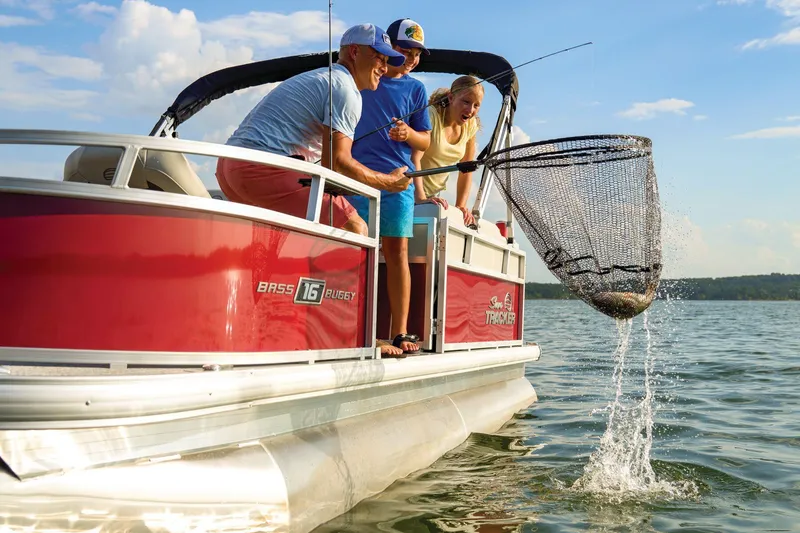 Slide: The Image of Manufacturer Provided Image: Family fishing on 2026 Sun Tracker Bass Buggy 16 XL Select pontoon boat. - 82