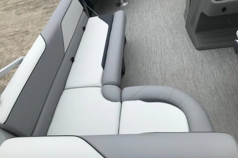 Slide: The Image of 2026 Avalon 19 Venture Quad Fish boat interior with gray and white seating. - 15
