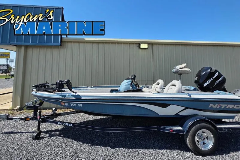 Slide: The Image of 2008 Nitro 482 DC boat at Bryan's Marine dealership, featuring Mercury engine. - 0