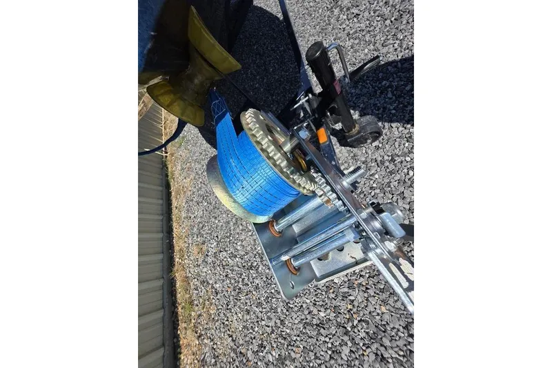 Slide: The Image of Blue winch strap on gravel near Nitro 482 DC, 2008 model. - 18