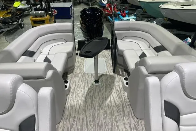 Slide: The Image of 2024 SunCatcher Select 322RC pontoon boat interior with plush seating and modern design. - 6